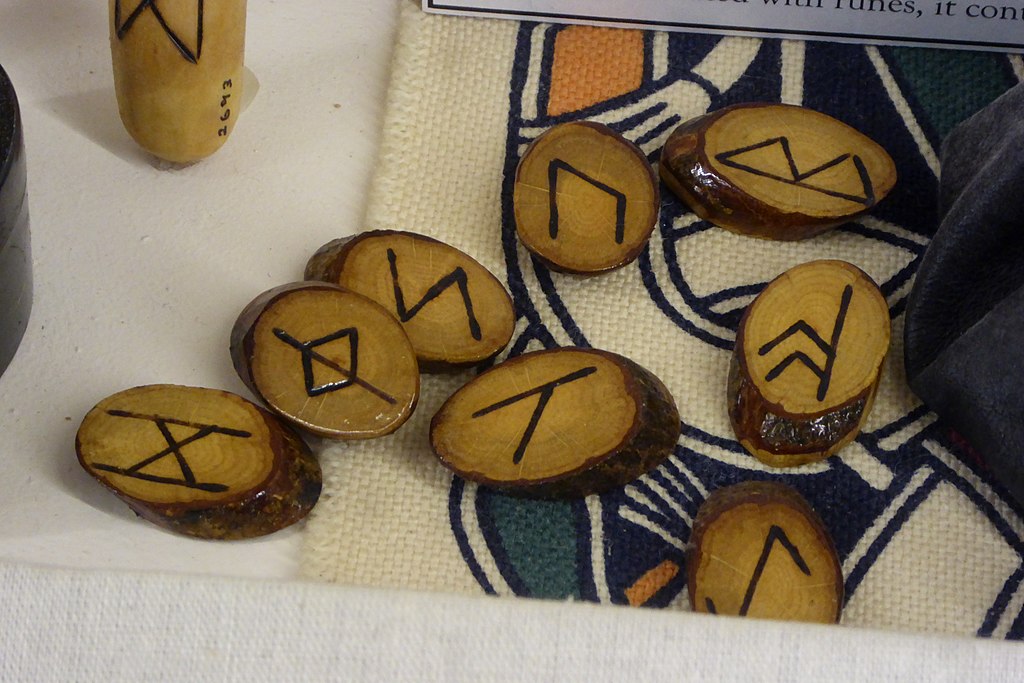 Wooden runes used for divination on display in the Museum of Witchcraft and Magic, Boscastle, Cornwall.