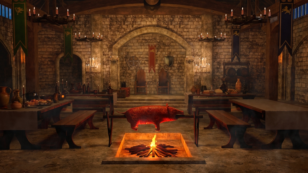 Medieval Viking dining hall interior with a pig roasting over an open fire