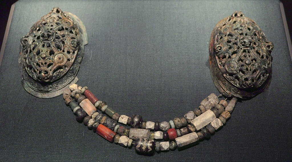 Brooch with glass and stone beads, Valsgärde cremation grave 94, 10th century "The Vikings Begin" exhibit, Nordic Museum, Seattle, Washington, U.S. The glass beads would be of Mediterranean origin.