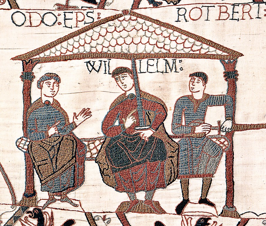  Bayeux Tapestry - Scenes 55 & 56 - Duke William lifts his helmet to be recognized on the battlefield of Hastings. Eustace II, Count of Boulogne points to him with his finger.